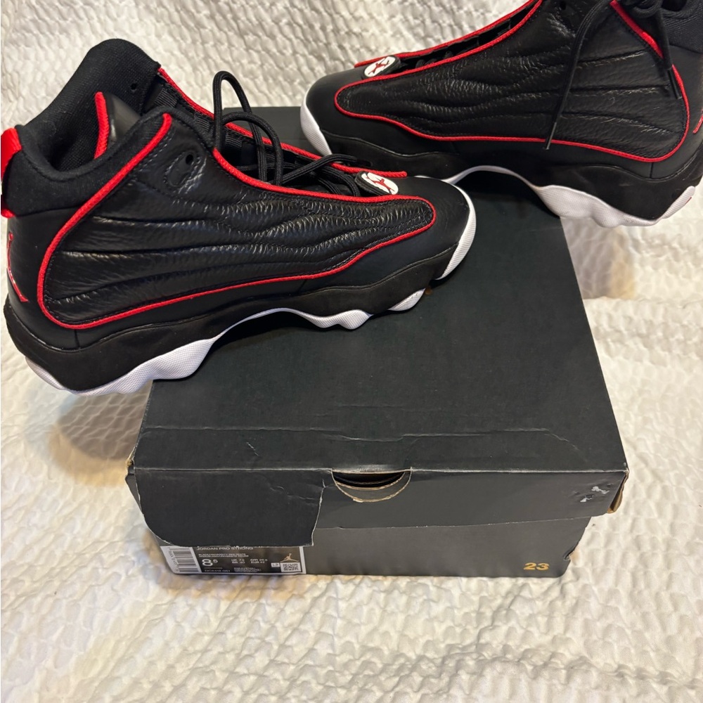 Air Jordan Black and Red High-Tops